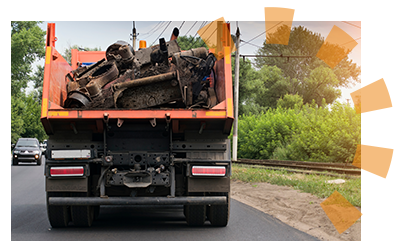 Different metal pieces in the back of a junk removal truck.